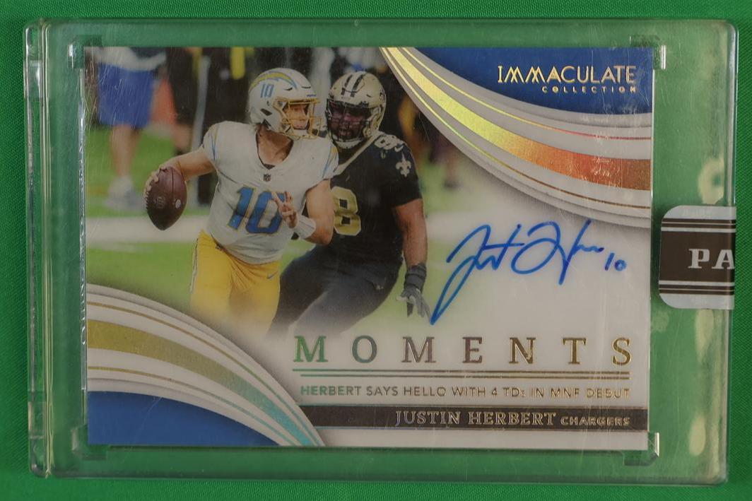 2022 Panini Immaculate IMA-JHE Justin Herbert Moments Chargers Auto